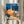 Contemporary Y2K cyberpunk-inspired wall art depicting a saxophone with coffee and urban nightscape elements in bold periwinkle, orange, and cream palette for creative spaces.