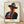 Pop art portrait of John Wayne in bold orange, yellow, and black tones, framed poster with Warhol's iconic style and ironic cowboy imagery.