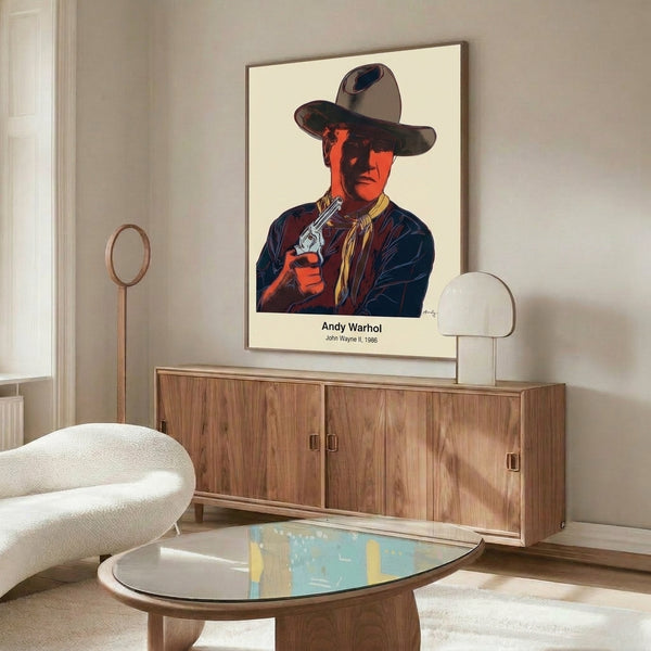 Pop art cowboy portrait in contrasting orange, white, and green with black graphic elements; a bold contemporary take on western imagery.
