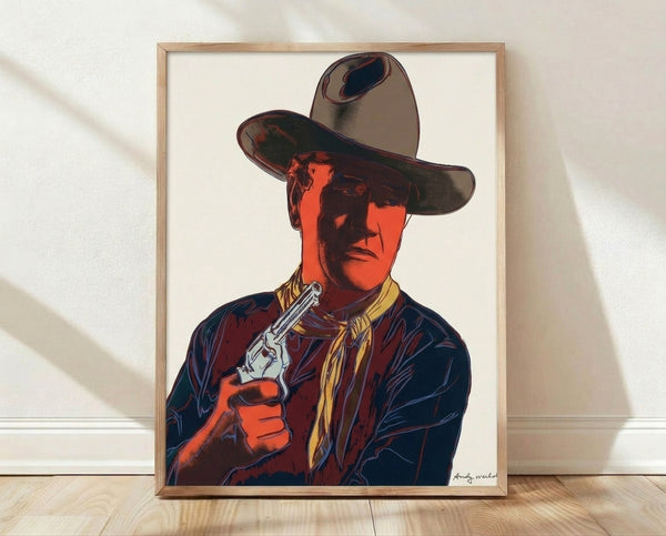 Pop art portrait of John Wayne in vibrant color blocks with bold outlines, framed poster in Warhol's iconic style.