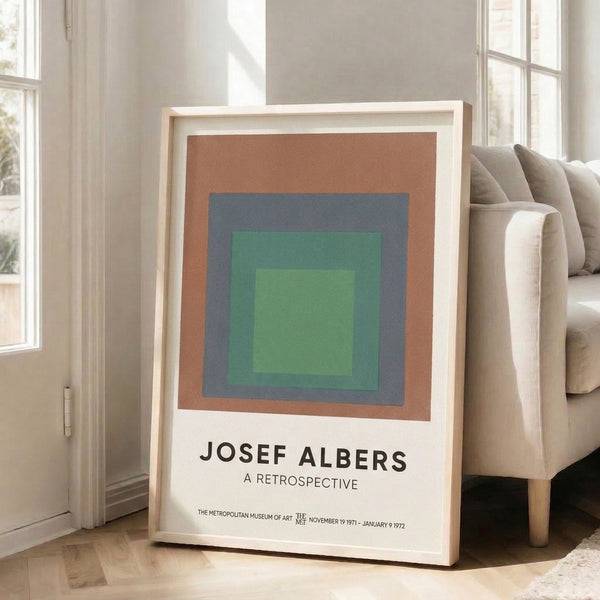 Geometric color field poster with nested rectangles in terracotta, slate blue, and sage tones; a serene Bauhaus-inspired composition.
