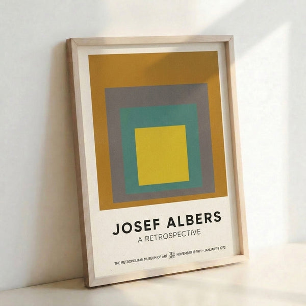 Framed poster art displaying nested rectangular forms in muted ochre, gray, and teal with yellow accents in a Bauhaus minimalist style.