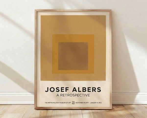 Nested square composition in warm earth tones of tan, ochre, and cream, showcasing the meditative color field work characteristic of Bauhaus minimalism.
