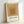 Contemplative color study with layered tan and cream squares, a hallmark of minimalist Bauhaus aesthetics displayed as a wall art print.