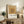 Color field artwork showing nested geometric squares in warm earth tones, representing the harmonious principles of mid-century minimalist design.