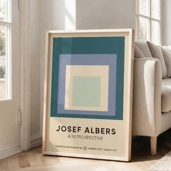 Geometric wall art featuring interlocking squares in muted sage green, teal, mauve, and cream tones creating a balanced, meditative visual rhythm in this museum-quality print.