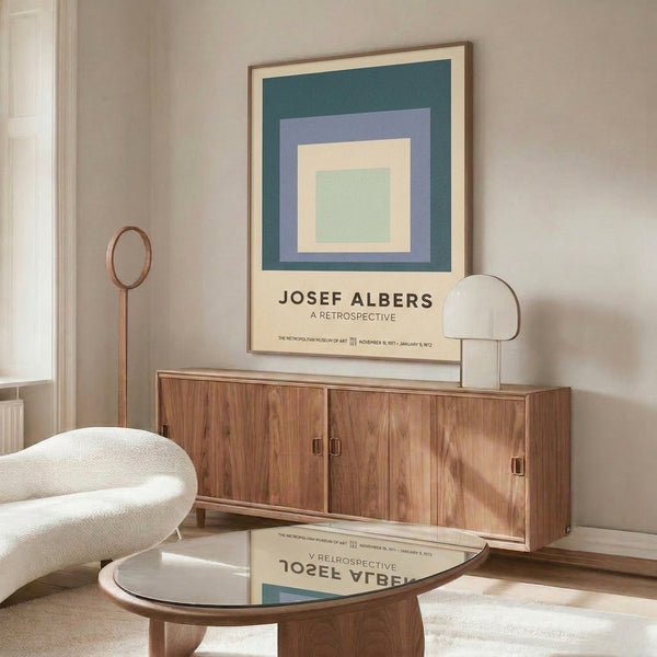 Framed minimalist artwork showcasing nested color field squares in sage green, teal, mauve, and cream reflecting Bauhaus geometric abstraction and meditative balance.