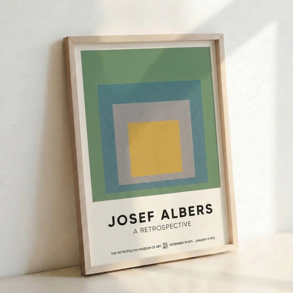 Mid-century modern poster displaying Albers' iconic nested square composition in muted tones of sage, warm gray, and soft blue, evoking calm and balance.