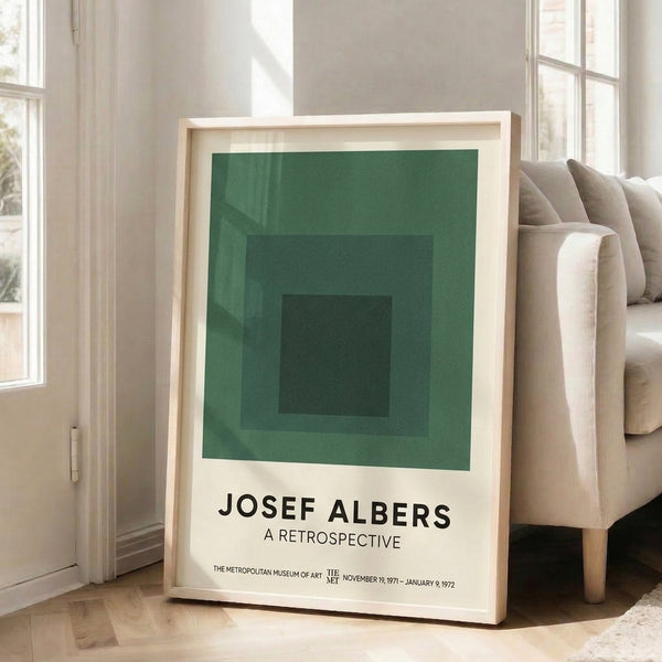 Sage green and forest green concentric squares on cream background, a contemplative Bauhaus-inspired geometric composition framed as museum-quality wall art.