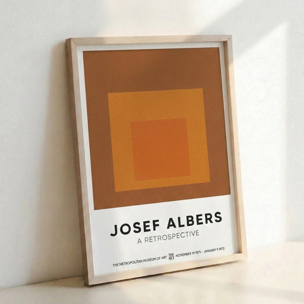 Contemporary geometric wall art displaying layered squares in burnt sienna and terracotta tones, embodying minimalist color theory and visual balance.