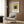 Concentric square design in gray and warm earth tones, a minimalist geometric artwork reflecting Bauhaus modernist sensibilities.