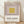 Minimalist Bauhaus poster featuring nested squares in cream, mauve, mustard yellow, and taupe creating a meditative geometric composition framed on a wall.