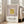 Bauhaus-inspired minimalist artwork of layered squares in soft cream, taupe, and golden yellow tones creating a serene geometric focal point.