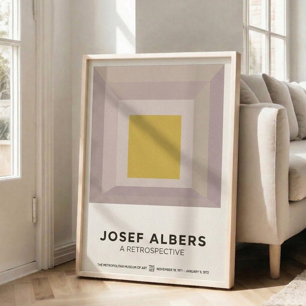 Bauhaus-inspired minimalist artwork of layered squares in soft cream, taupe, and golden yellow tones creating a serene geometric focal point.