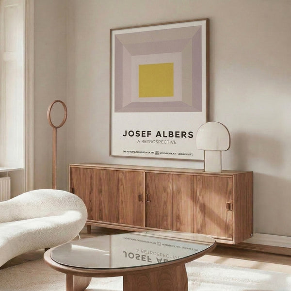 Contemplative geometric art with nested rectangles in soft earth tones of cream, mauve, and mustard yellow displayed as a framed wall poster.