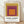 Concentric squares in warm gold, burgundy, and plum tones arranged in a minimalist Bauhaus composition, creating a meditative geometric artwork framed as a poster on a wall.