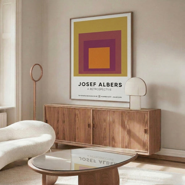 Bauhaus-style concentric rectangles in soft gold, deep burgundy, and plum create an optically harmonious, contemplative geometric poster for contemporary interiors.