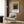 Geometric art print presenting stacked squares in cream, mustard gold, and charcoal against a clean background, reflecting modernist principles of form and color harmony.