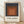 Minimalist abstract poster featuring nested squares in charcoal gray, rust brown, terracotta, and warm tan, creating meditative geometric harmony on a framed wall art print.