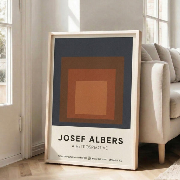 Nested geometric squares in warm rust brown and gray tones create subtle visual rhythm in this minimalist framed art print.