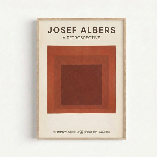 Bauhaus-inspired art print with concentric squares in warm terracotta and deep red hues, creating a meditative and sophisticated minimalist wall display.