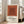 Bauhaus color field print featuring centered squares in warm rust and terracotta, creating a sophisticated and calming visual composition.