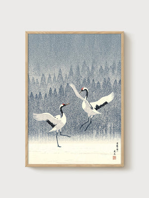 Dancing Cranes in Snow poster in oak frame