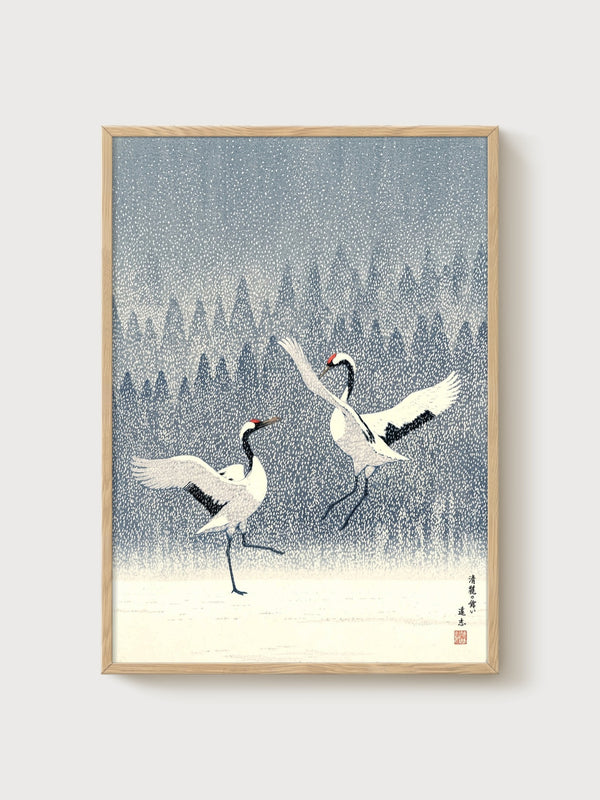 Dancing Cranes in Snow poster in oak frame