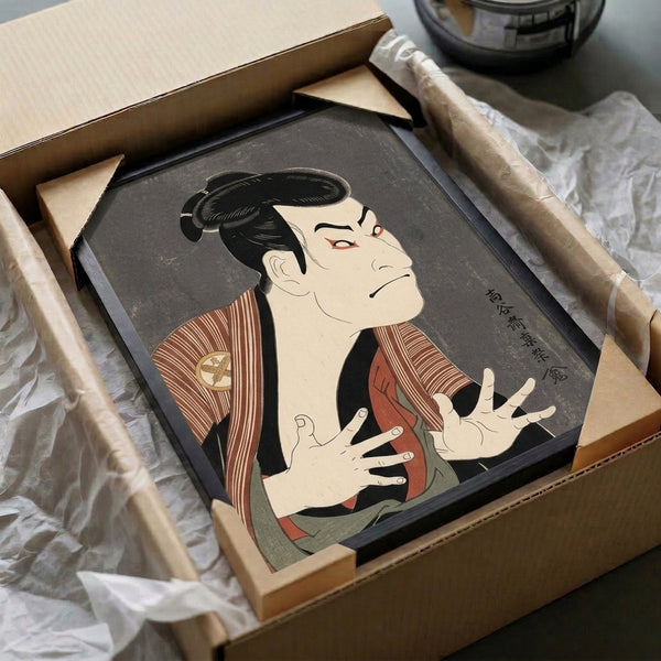 Theatrical Japanese woodblock portrait of a kabuki performer in elaborate traditional dress with striking facial expression, printed in rich blacks, creams, and warm reds.