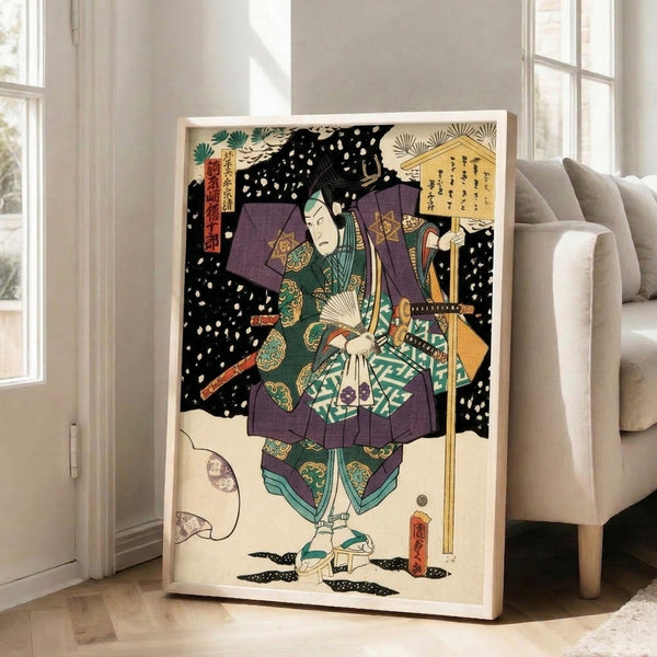 Framed traditional Japanese woodblock print showing Kawarazaki Gonjuro in ornate kabuki costume with katana, fan, and umbrella amid snow, rendered in dramatic deep purples and forest greens.