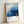 Modern minimalist poster depicting calm forest and mountain scenery in soft blues with gold accents, evoking wabi-sabi aesthetic.