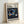 Constructivist-style wall art poster showcasing interlocking circles in navy, black, gold, pink, and teal creating a meditative and cosmic abstract composition.