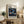 Abstract poster art featuring overlapping circular forms in a sophisticated palette of deep blue, cream, pink, and teal, evoking contemplative balance and harmony.