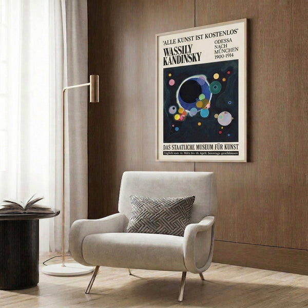 Minimalist Bauhaus-inspired framed print with concentric and scattered circles rendered in cosmic tones of navy, cream, yellow, pink, and teal.