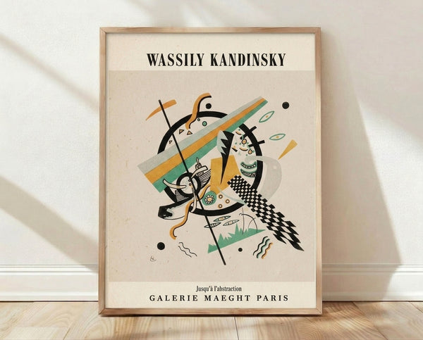 Abstract Bauhaus poster featuring dynamic geometric shapes in cream, orange, teal, and black on a minimalist composition, framed on a wall.