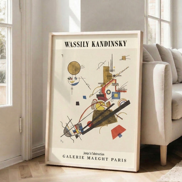 Bauhaus abstract print with energetic interplay of geometric elements—circles, lines, and shapes—in warm cream and gold against cool blue and black accents.