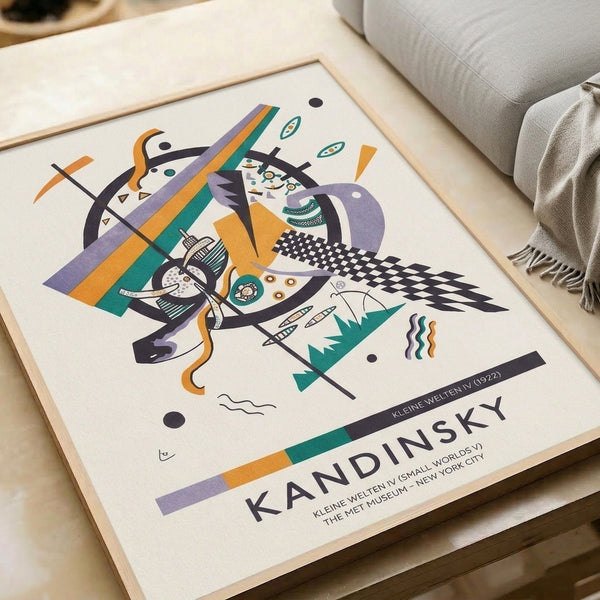 Dynamic abstract wall art with Bauhaus-inspired geometric forms—circles, angular shapes, and flowing lines—rendered in purple, orange, teal, and black.