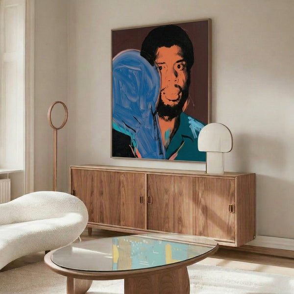 Bold pop art interpretation of Kareem Abdul-Jabbar featuring striking color combinations and simplified forms in Andy Warhol's celebrated style, framed.