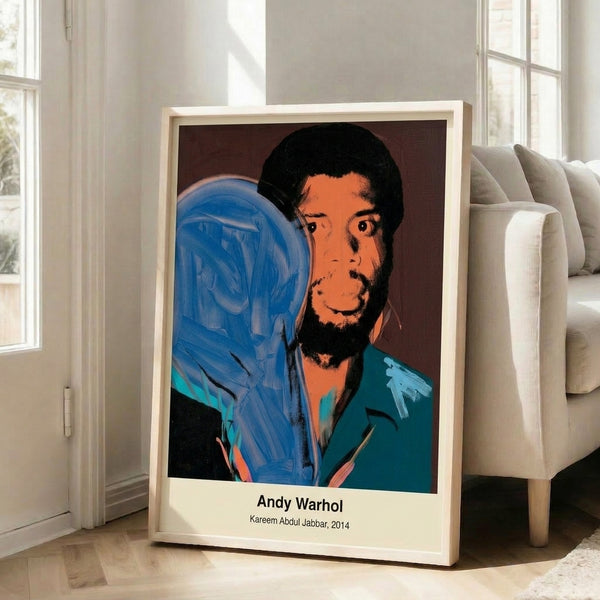 Andy Warhol-inspired pop art poster of Kareem Abdul-Jabbar in luminous yellow, neon blue, and hot pink creating a celebratory, energetic tribute to the sports legend.