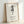 Philosophical wall art in muted tones of black and taupe on cream, showcasing elegant brushwork and Japanese characters in a minimalist Japandi style.