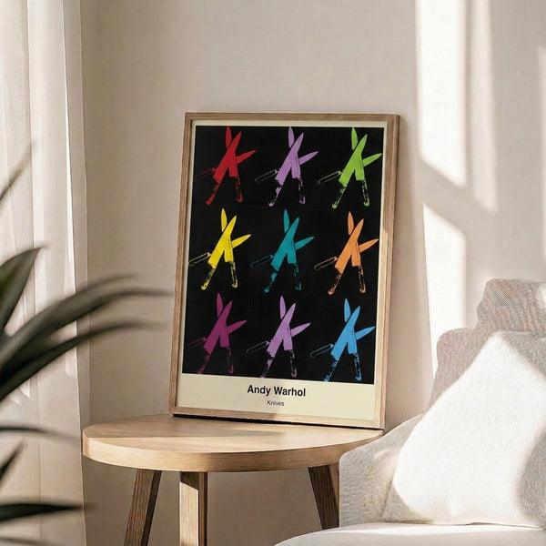 Modern framed print featuring serialized knives in monochromatic palette punctuated by red, embodying pop art's bold approach to serious subject matter.