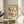 Minimalist Japandi art print showing graceful koi swimming in harmonious circular patterns rendered in cream, teal, coral, and dark green tones with gold detailing inspired by traditional Japanese aesthetics.