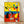 Abstract surrealist poster featuring organic shapes and bold lines in black, red, and blue tones on a cream background, evoking a dreamlike cosmic scene.