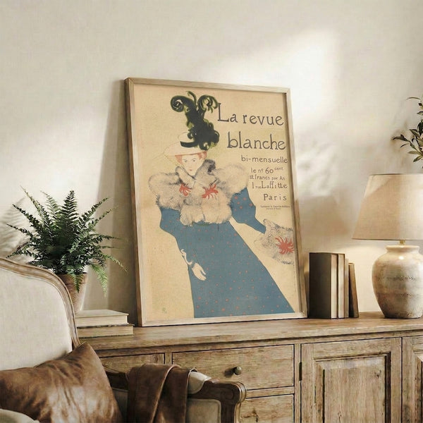 Vintage poster art showing a refined woman in cream dress with teal highlights, adorned with a striking feathered hat and gray fur details in sophisticated Art Nouveau style.
