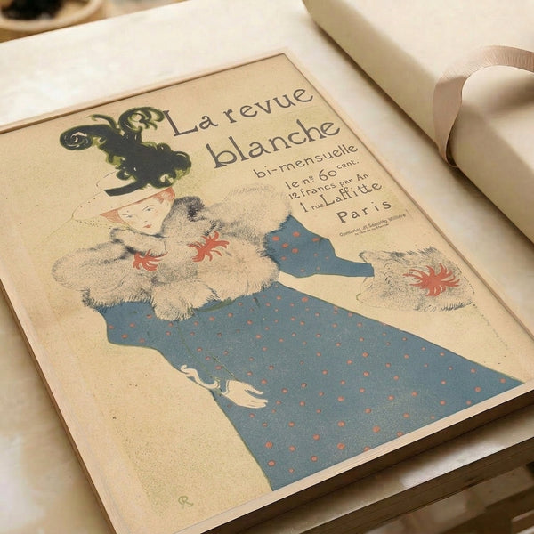 Framed artwork featuring a fashionable woman with a feathered hat and fur collar in soft cream, teal blue, and rust against black outlines in Art Nouveau design.