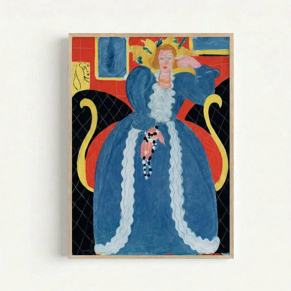Henri Matisse's Lady in Blue art print on wall, depicting a serene seated figure in rich cobalt tones with decorative motifs in warm ochres and earth colors, exemplifying Fauve style.