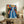 Matisse's iconic composition of a figure in deep blue tones framed on a wall, featuring the artist's signature approach to color and form with decorative background elements.