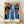 Framed Matisse-style poster of a contemplative woman in blue sitting by an open door overlooking a Mediterranean coast, with tropical palm trees and warm terracotta tones in a modern art nouveau composition.