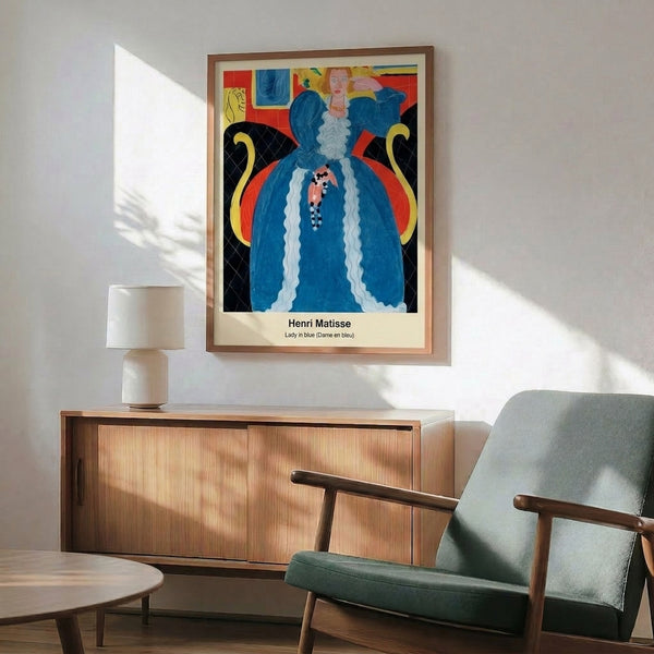 Serene modern poster showing a figure in blue positioned near a doorway with Mediterranean seascape, tropical vegetation, and ornamental patterns in warm gold and muted terracotta hues.