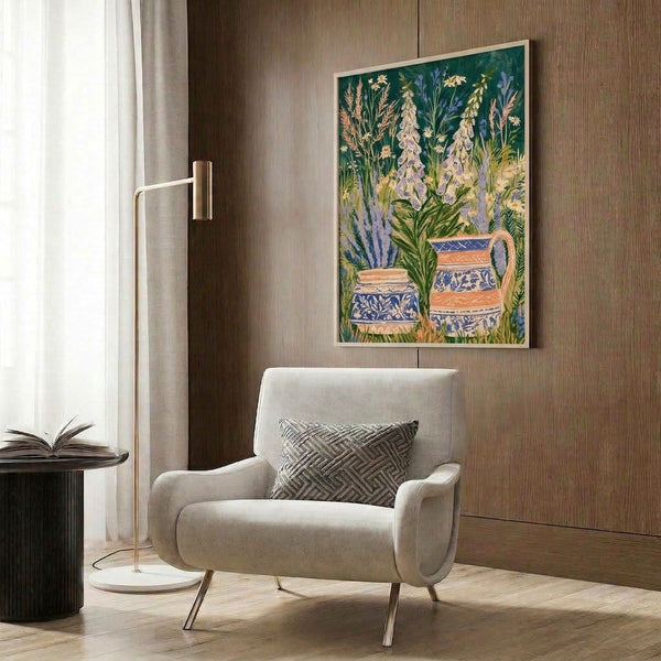 Framed boho wall art displaying delicate watercolor flowers including foxglove and daisies in cream ceramic pitchers, with a whimsical pastoral mood in lavender and navy hues.